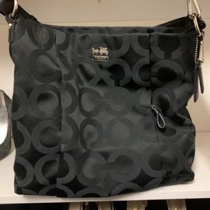 Black coach purse with adjustable strap